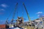 Уникальная операция: гигантскую мачту стакера-реклаймера устанавливают в морском порту Шахтёрска